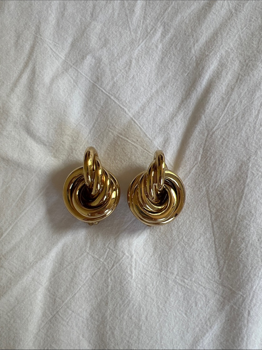 Gold knot costume jewelry clip on earrings